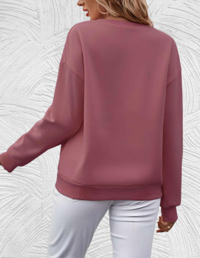 Velanora- Oversized sweater met ronde hals en 'share your light'-statement op de voorkant