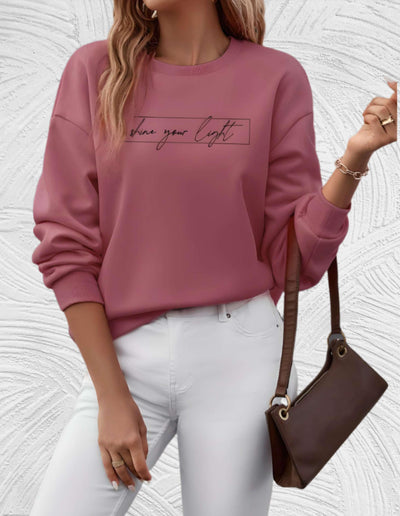 Velanora- Oversized sweater met ronde hals en 'share your light'-statement op de voorkant