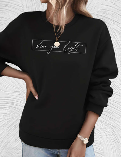 Velanora- Oversized sweater met ronde hals en 'share your light'-statement op de voorkant