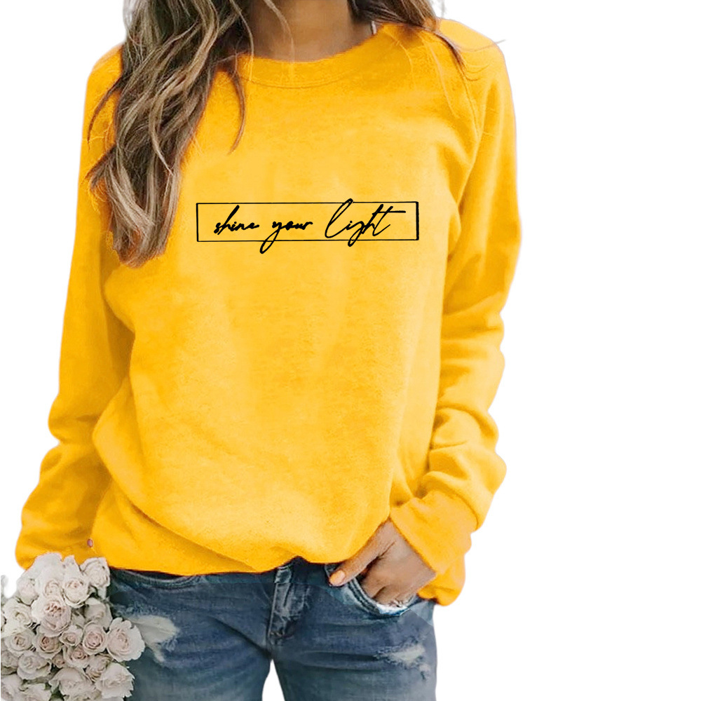 Velanora- Oversized sweater met ronde hals en 'share your light'-statement op de voorkant