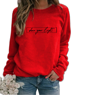 Velanora- Oversized sweater met ronde hals en 'share your light'-statement op de voorkant